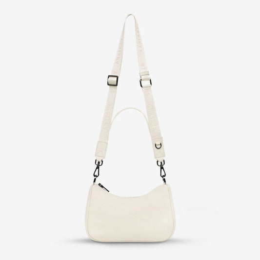 The Status Anxiety Look Both Ways Bag in Chalk on a grey background