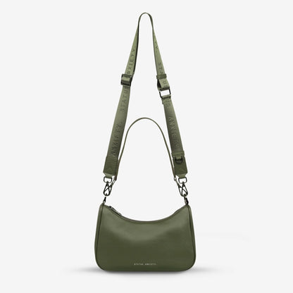 The Status Anxiety Look Both Ways Bag in Khaki on a grey background