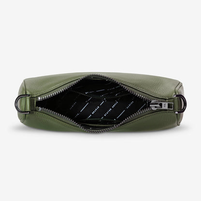 An inside view of the Status Anxiety Look Both Ways Bag in Khaki on a grey background