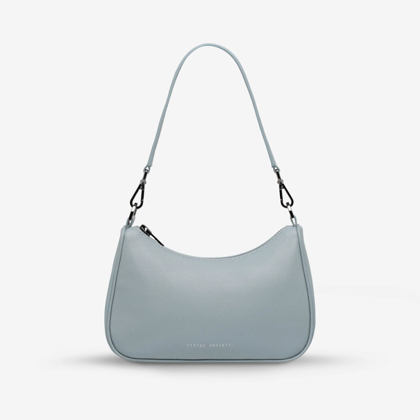 The Status Anxiety Look Both Ways in Powder Blue with the short strap on