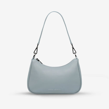 The Status Anxiety Look Both Ways in Powder Blue with the short strap on