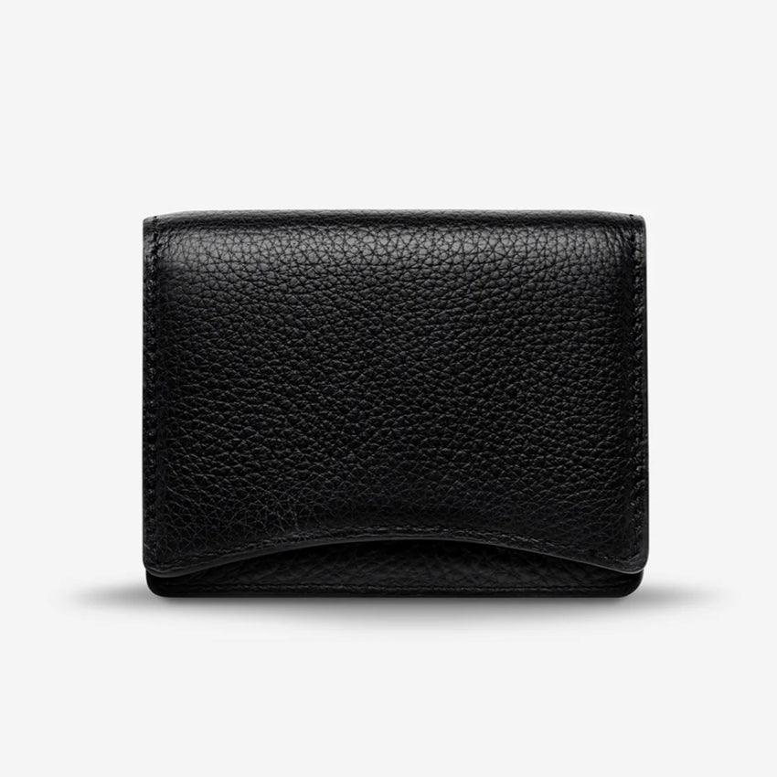 The Status Anxiety Lumen Wallet in Black on a blank background