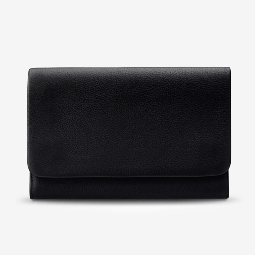 The Status Anxiety Remnant Wallet in Black on a blank background