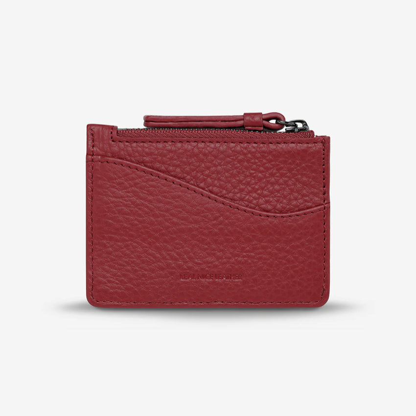 The Status Anxiety Hearts Still Beating Wallet in Rouge on a grey background