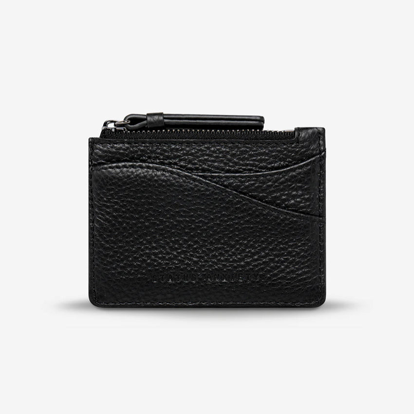 The Status Anxiety Hearts Still Beating Wallet in Black on a grey background