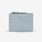 The Status Anxiety Hearts Still Beating Wallet in Powder Blue on a grey background
