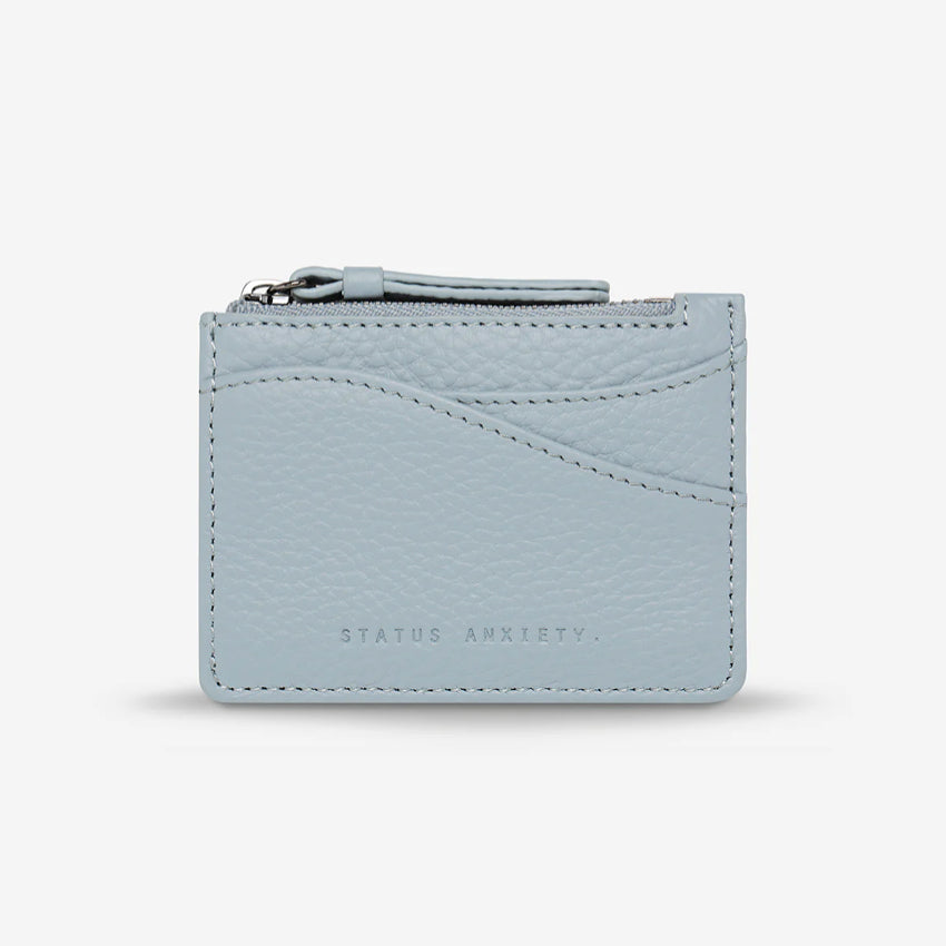 The Status Anxiety Hearts Still Beating Wallet in Powder Blue on a grey background