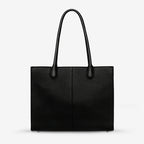 The Status Anxiety Without Warning Bag in Black on a grey background