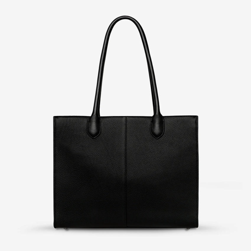 The Status Anxiety Without Warning Bag in Black on a grey background
