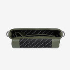 A top view of the Status Anxiety Zenith Bag in Khaki open on a blank background