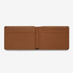 The Status Anxiety Jonah Wallet in Tan open on a blank background
