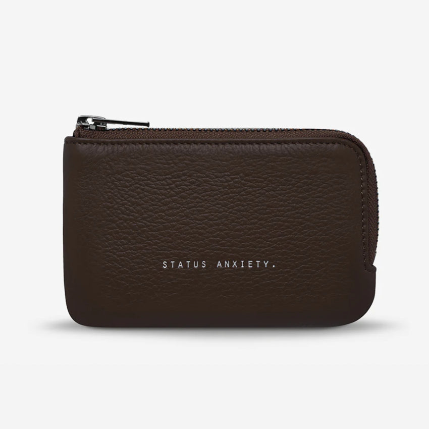 The Status Anxiety Left Behind Wallet in Cocoa on a blank background