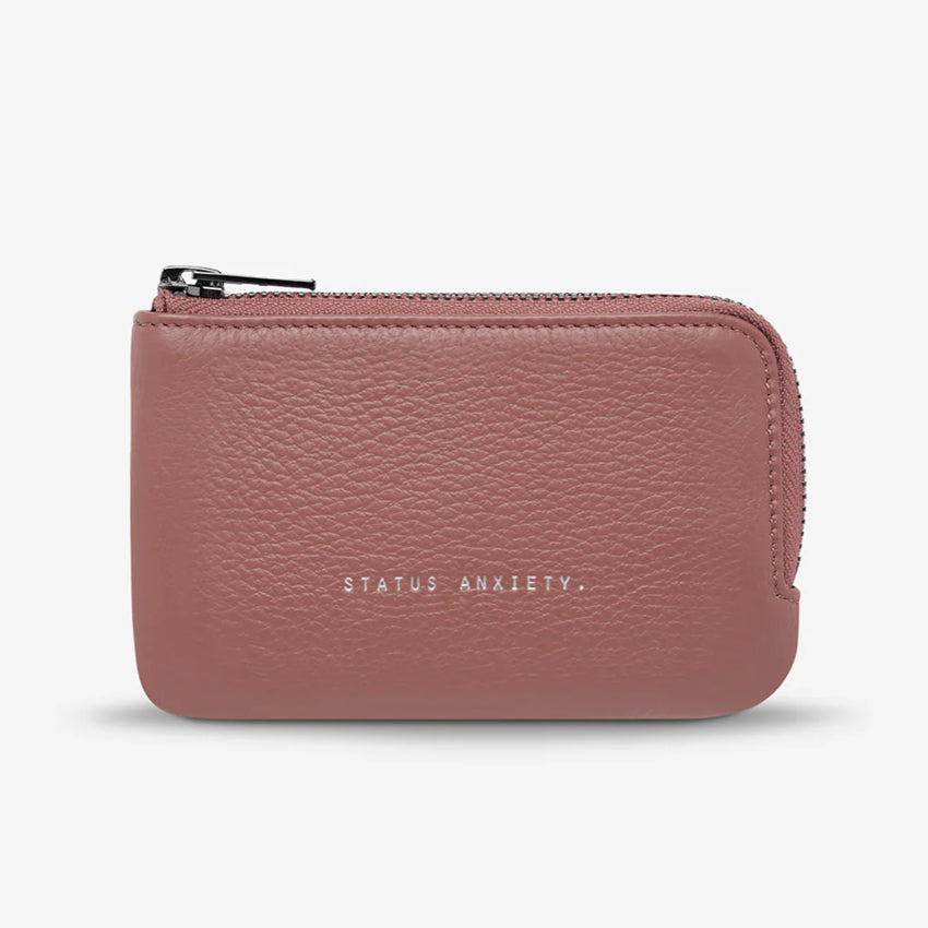 The Status Anxiety Left Behind Wallet in Dusty Rose on a blank background