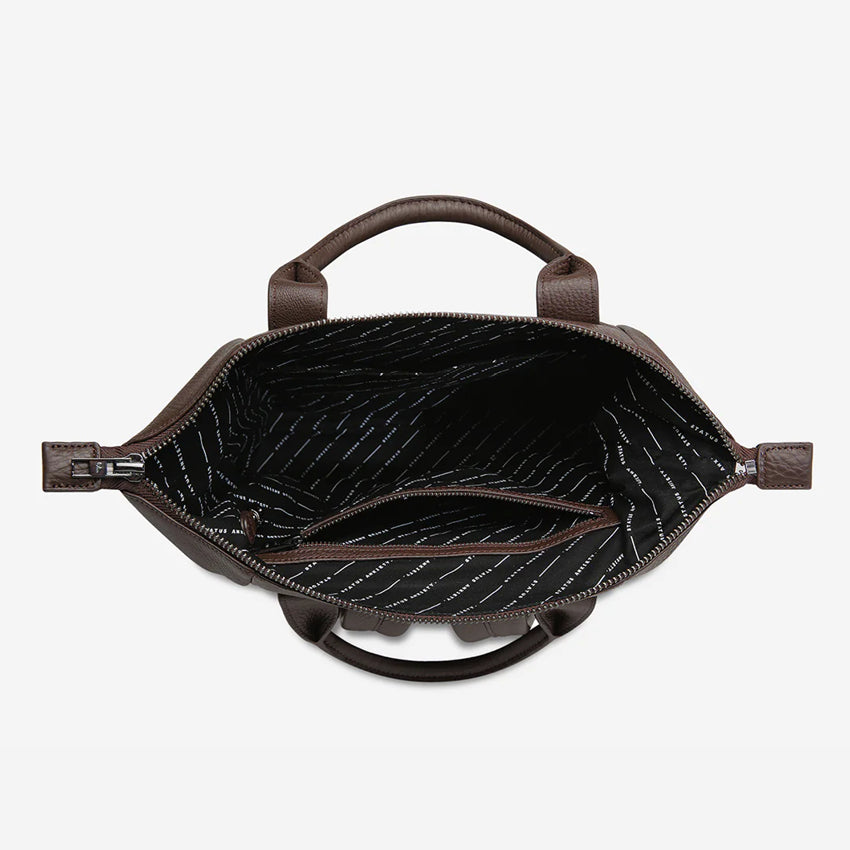 A top view of the Status Anxiety Mini Waves Bag in Cooca open on a blank background