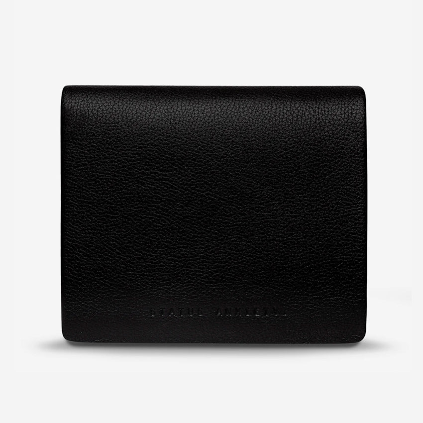 The Status Anxiety Nathaniel Wallet in Black on a blank background