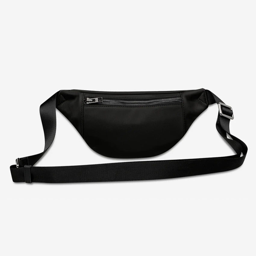 The backside of the Status Anxiety Piper Recycled Bag in Black on a blank background