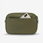 The back of the Status Anxiety Plunder Bag in Khaki with a phone poking out on a blank background