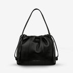 The Status Anxiety Point Of No Return Bag in Black on a blank background