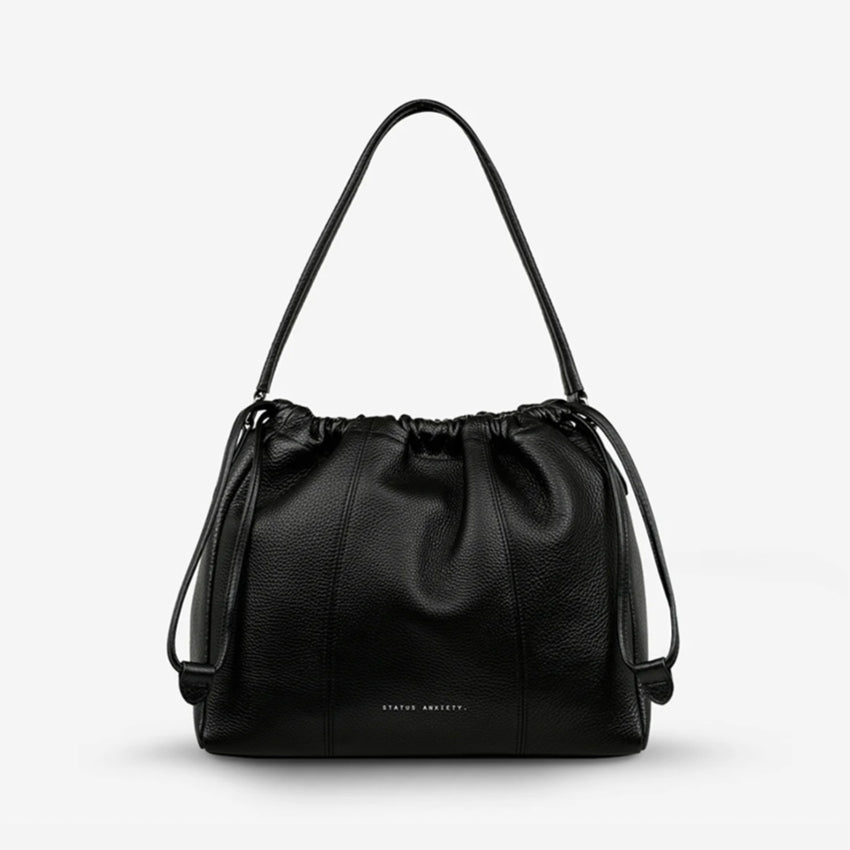 The Status Anxiety Point Of No Return Bag in Black on a blank background