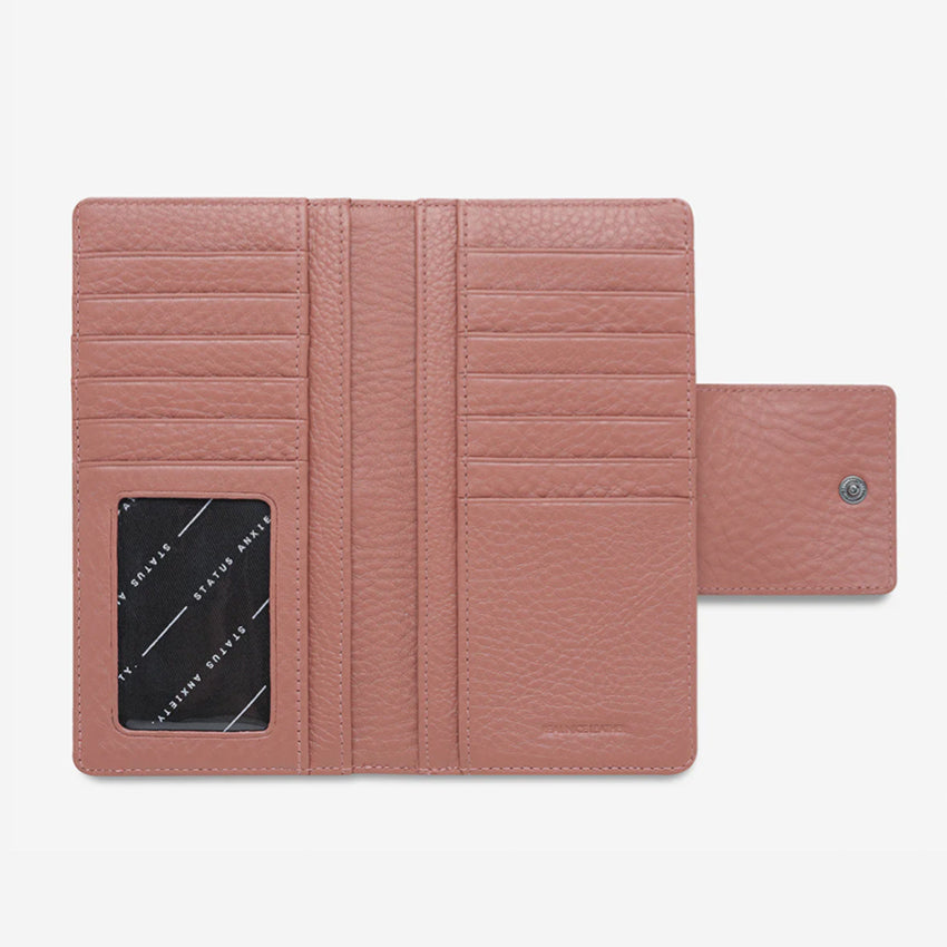The Status Anxiety Ruins Wallet in Dusty Rose open on a Blank Background