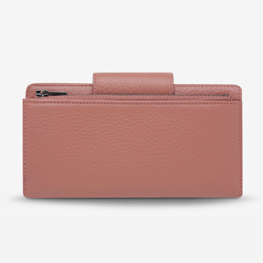 The backside of the Status Anxiety Ruins Wallet in Dusty Rose on a Blank Background