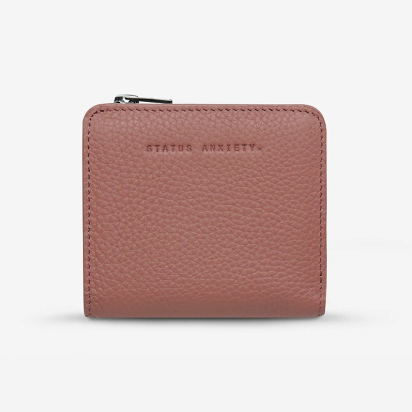 The Status Anxiety Sense Of Wonder Wallet in Dusty Rose on a blank background