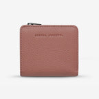 The Status Anxiety Sense Of Wonder Wallet in Dusty Rose on a blank background