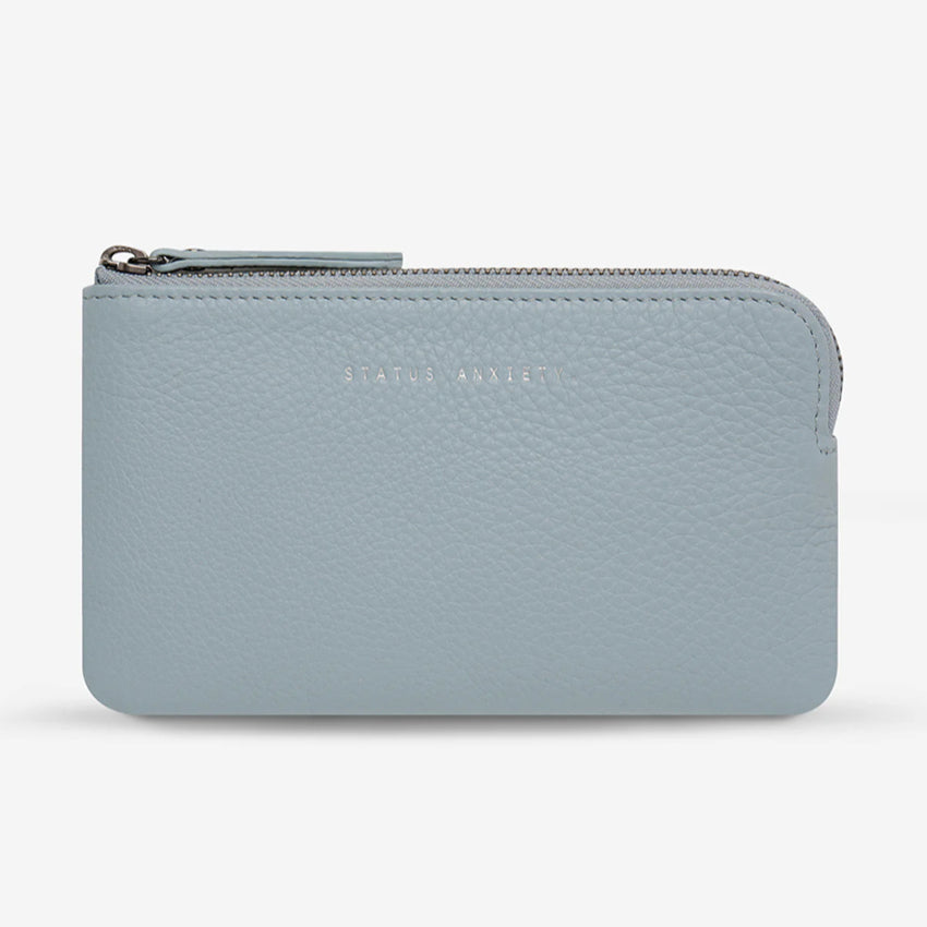  The Status Anxiety Smoke and Mirrors Wallet in Powder Blue on a blank background