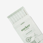 The Sucker Cocktail Straws in clear in the packaging on a blank background