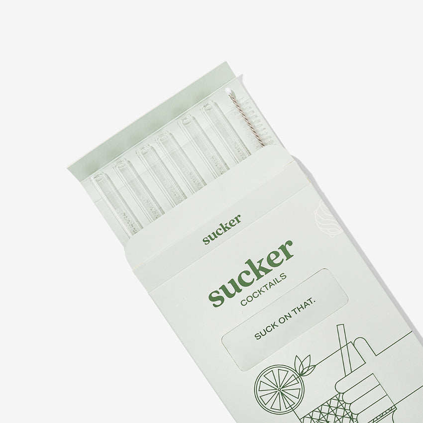 The Sucker Cocktail Straws in clear in the packaging on a blank background