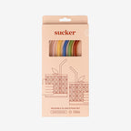 The Sucker Reusable Glass Straws in Multi in the packaging on a blank background
