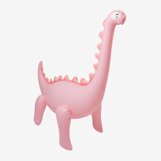 The SunnyLife Dino Giant Sprinkler in Pink on a grey background