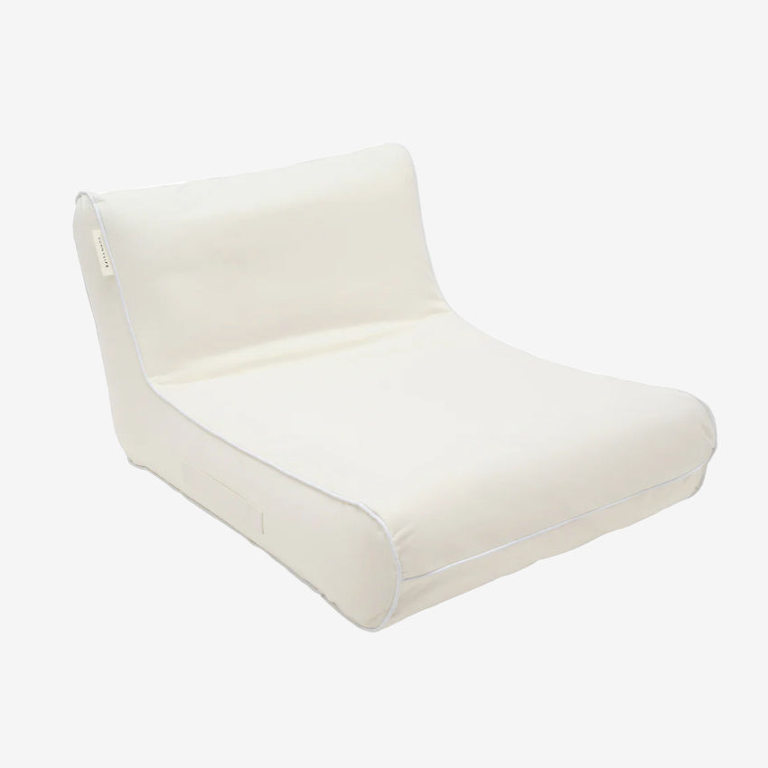 The Sunny Life Luxe Floating Chair in Cream on a grey background