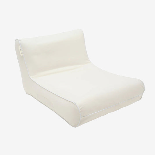 The Sunny Life Luxe Floating Chair in Cream on a grey background
