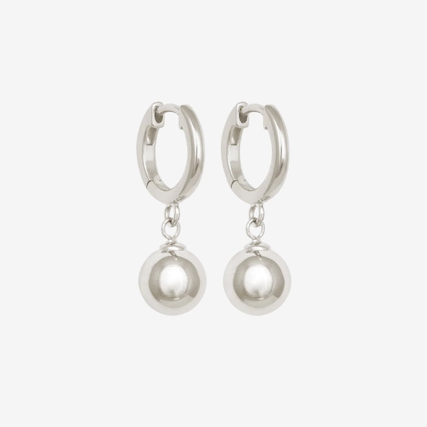 The Temple Of The Sun Alba Huggies in Sterling Silver on a grey background