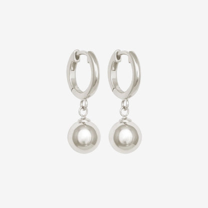 The Temple Of The Sun Alba Huggies in Sterling Silver on a grey background