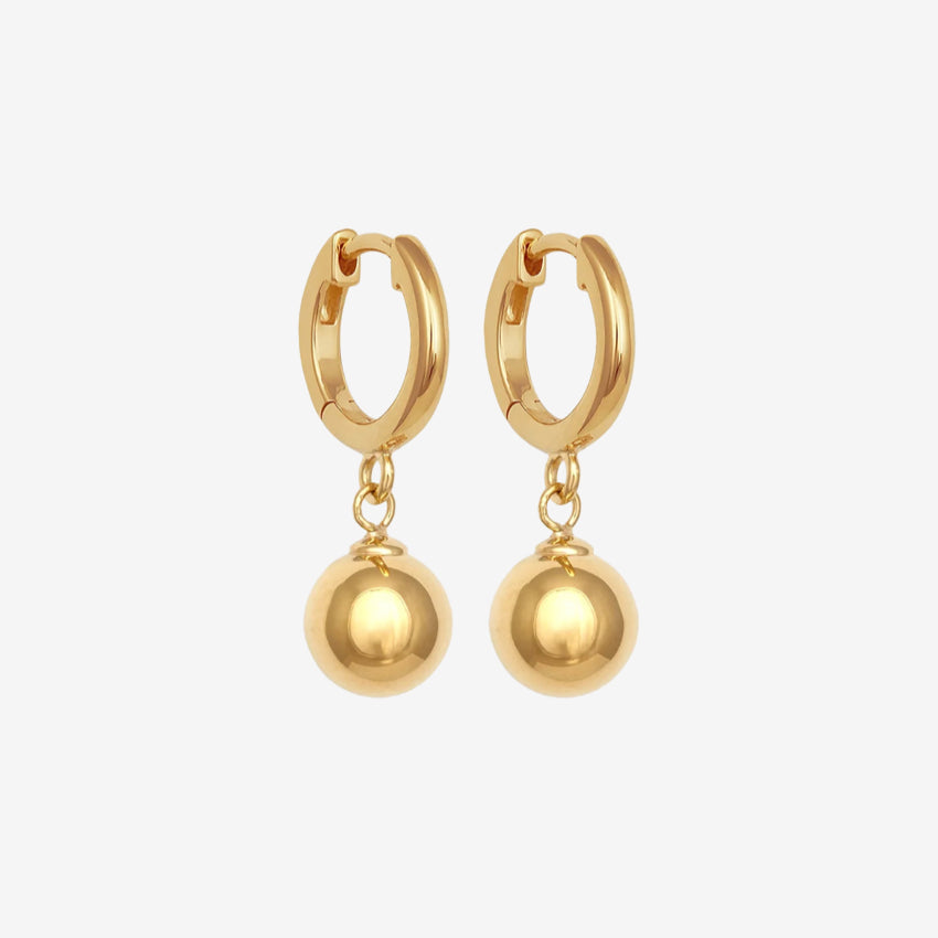 The Temple Of The Sun Alba Huggies in Gold Vermeil on a grey background