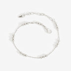 The Temple Of The Sun Alba Station Bracelet in Sterling Silver on a grey background