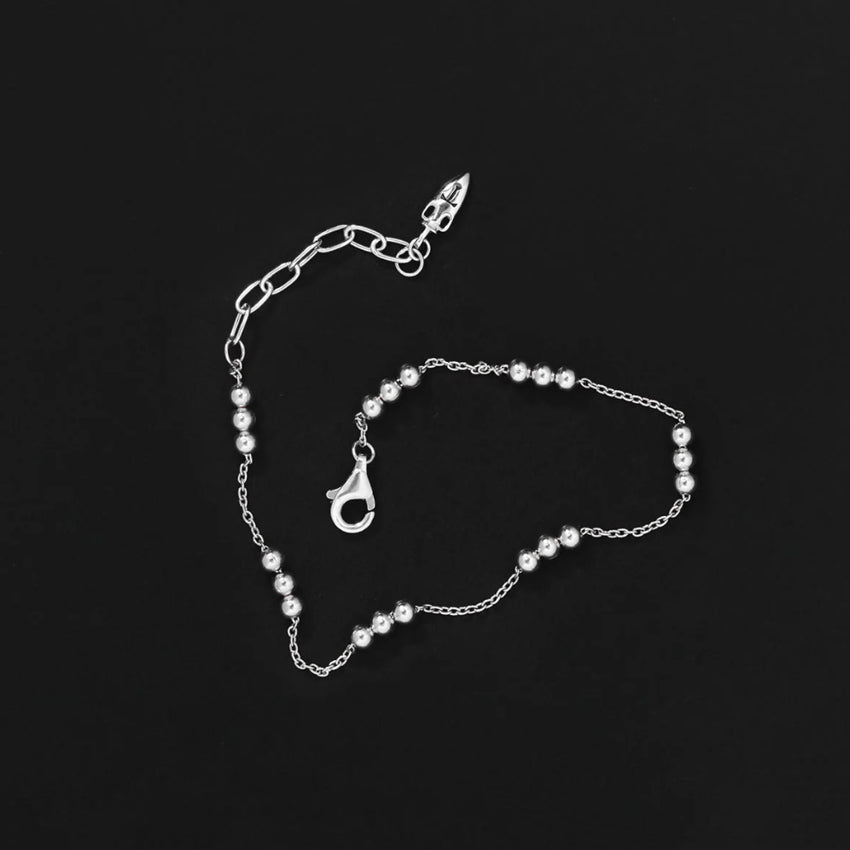 The Temple Of The Sun Alba Station Bracelet in Sterling Silver on a black background