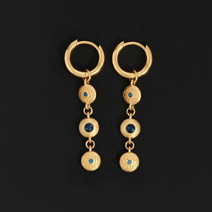 The Temple Of The Sun Blessing Earrings in Gold on a black background