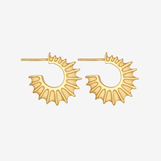 The Temple Of The Sun Calypso Hoops in Gold Vermeil on a grey background
