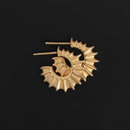 The Temple Of The Sun Calypso Hoops in Gold Vermeil on a black background