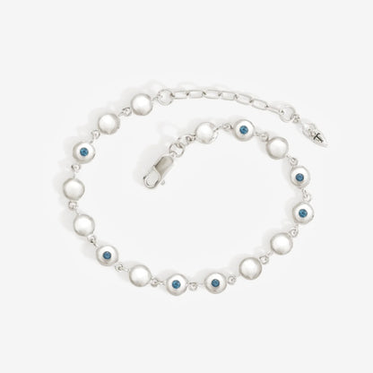 The Temple Of The Sun Mavi Chain Bracelet in Sterling Silver on a grey background