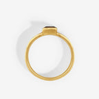 A side view of the Temple Of The Sun Sparta Ring in Gold on a blank background
