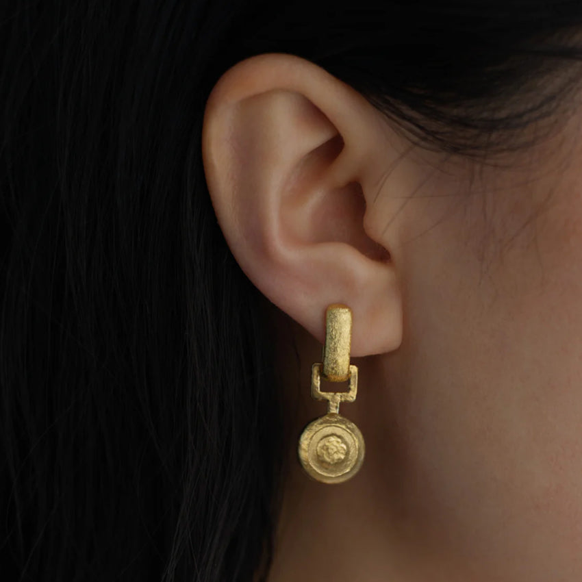 The Temple Of The Sun Alida Earrings in Gold Vermeil on a models ear