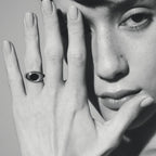 The Temple Of The Sun Kosmos Ring in Sterling Silver on a models finger