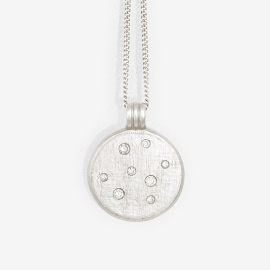 The Temple Of The Sun Nebula Necklace in Silver on a blank background