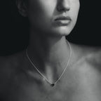 The Temple Of The Sun Venus Necklace in Sterling Silver on a model in black and white