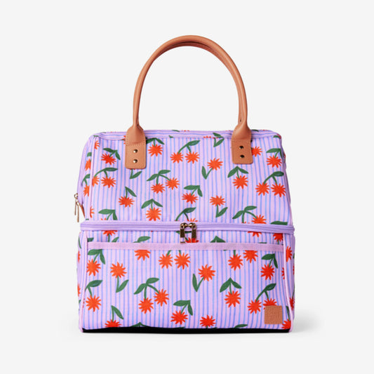 The Somewhere Co Cooler Bag in Sunburst on a grey background