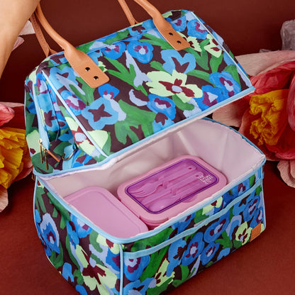 The Somewhere Co Lunch Bag in Pansy Patch being held open
